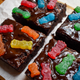 Brownies with ganache frosting and Sour Patch Kids on top